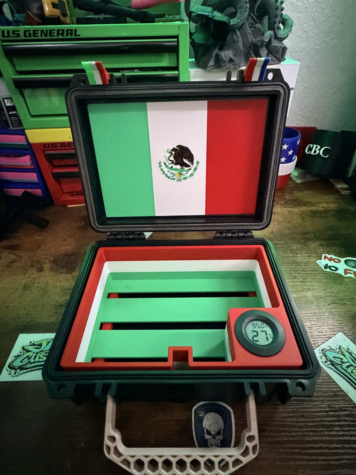 Close view of fitted red and green trays inside a presentation case