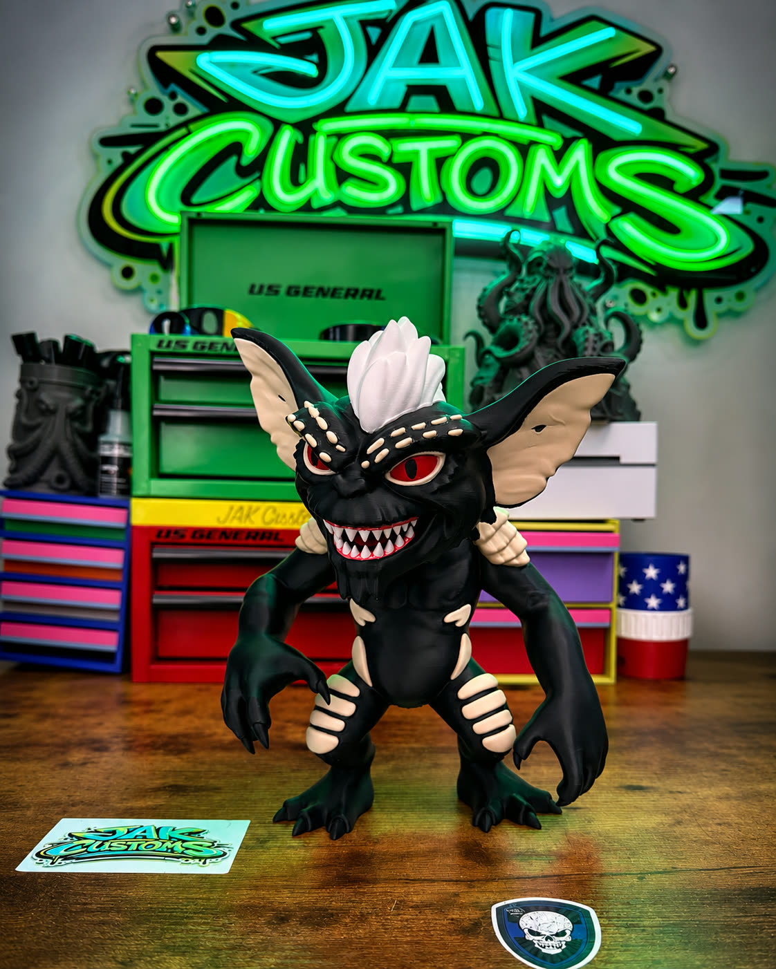 Wide-grinning creature figure printed and painted by hand