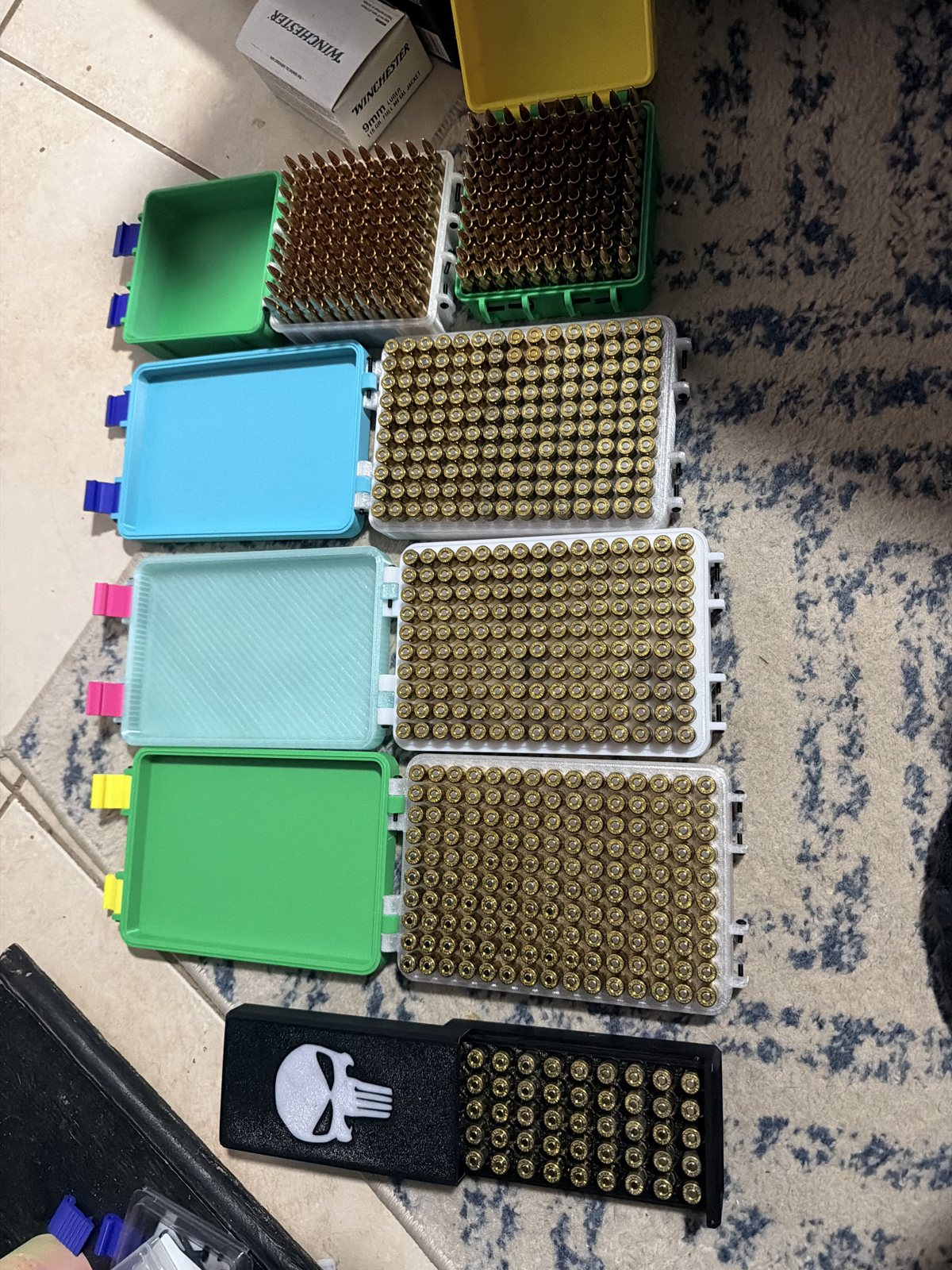 Assorted printed cases and trays with fitted compartments