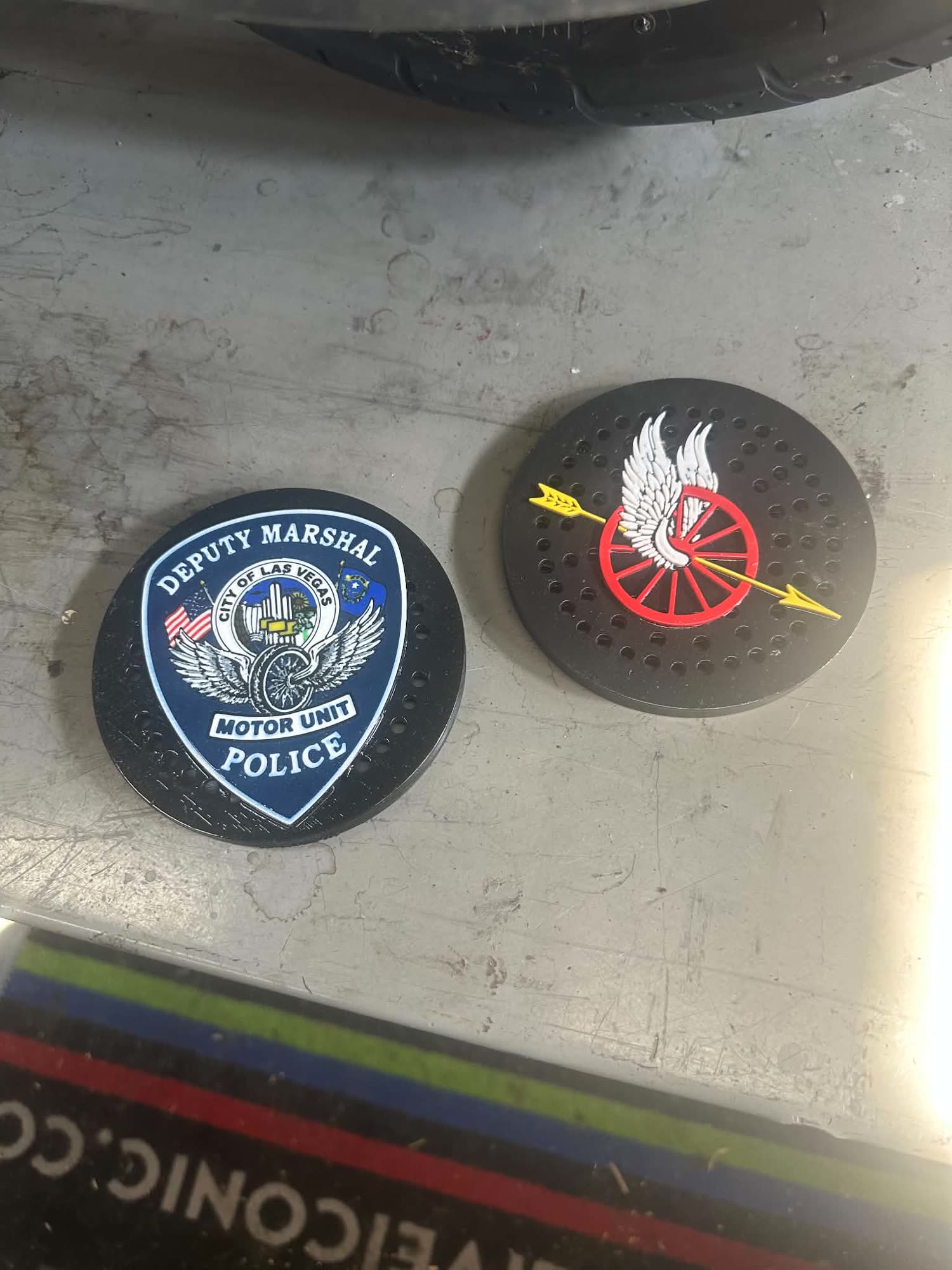 Printed emblem badge mounted on painted bodywork