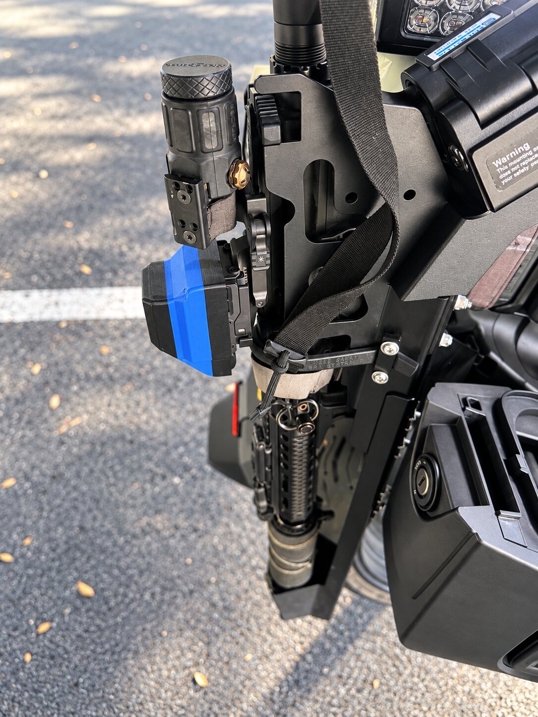 Side view of custom siren cover mounted on a police motorcycle