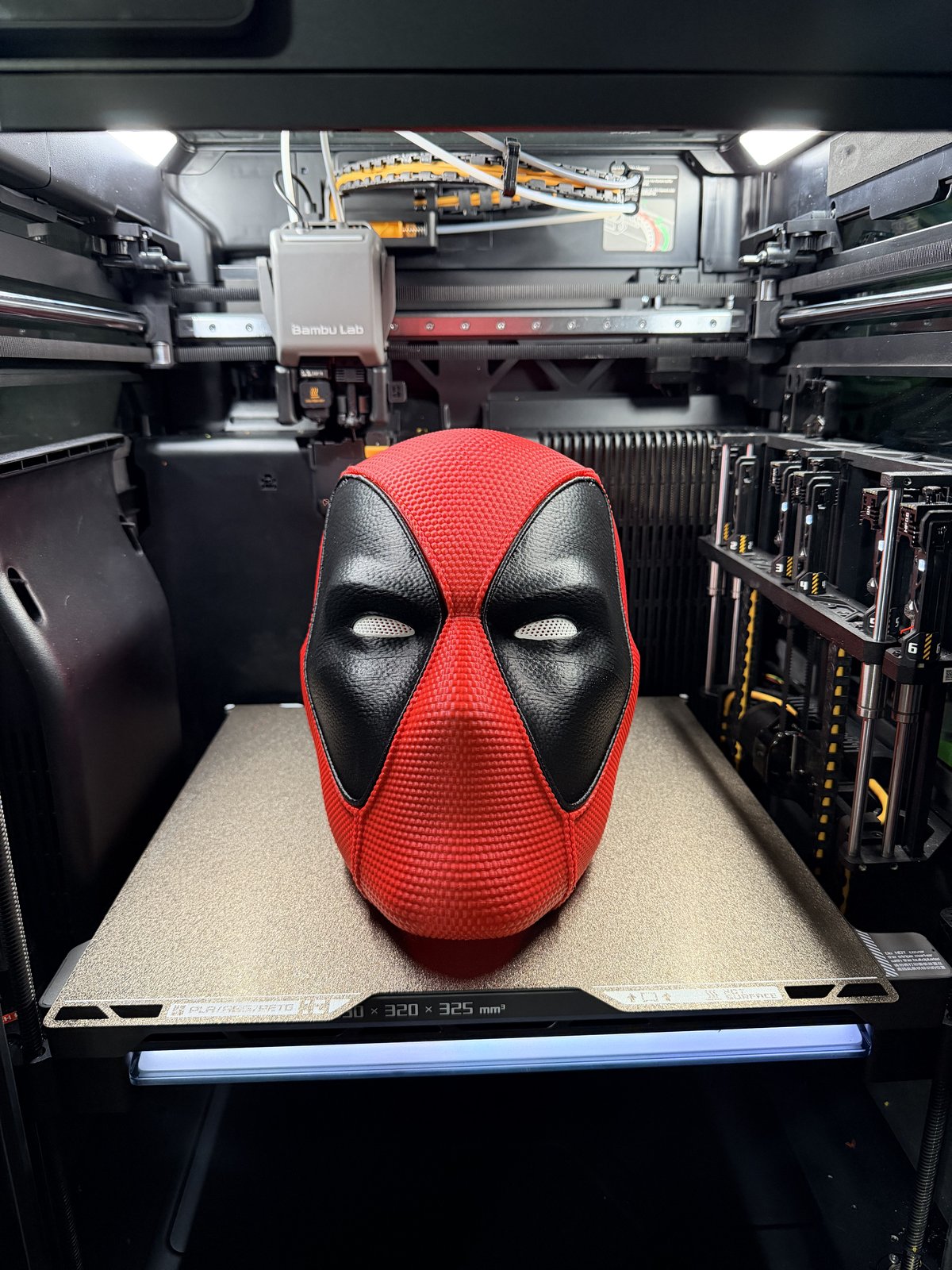 Red and black Deadpool-style mask, printed, straight-on view