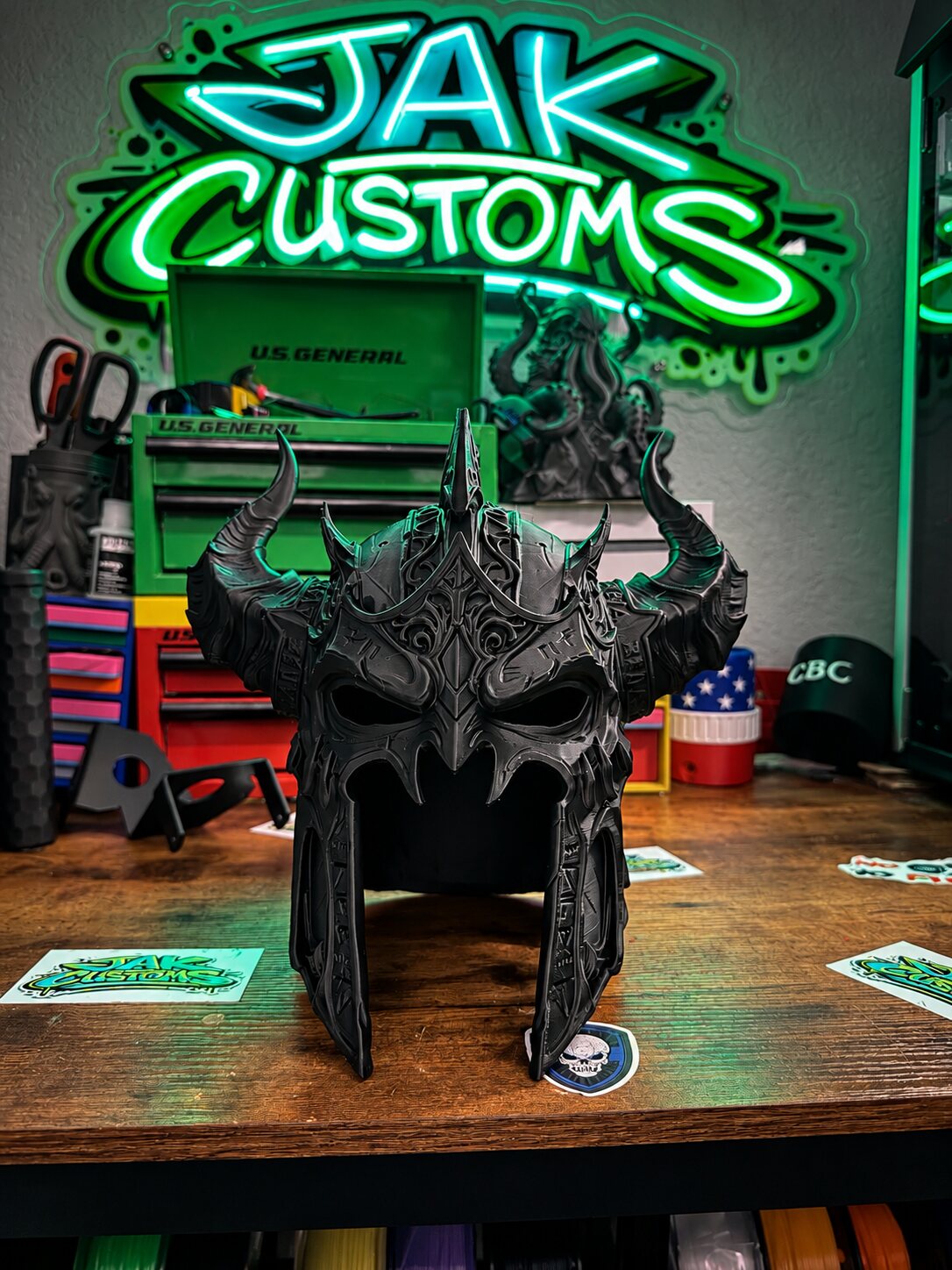 Black sculpted creature helmet, front profile