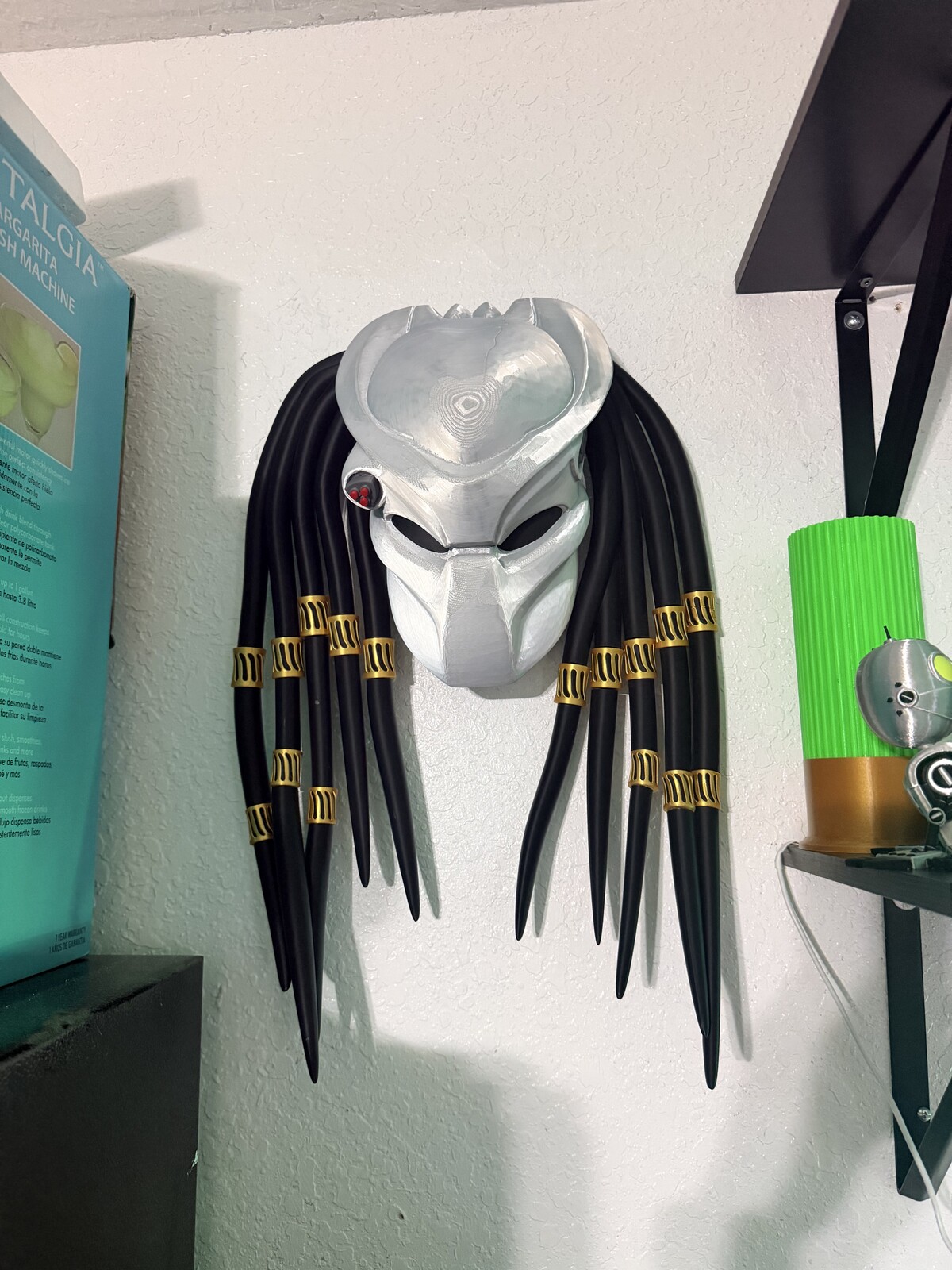 Predator-style mask wall mount with printed dreadlocks