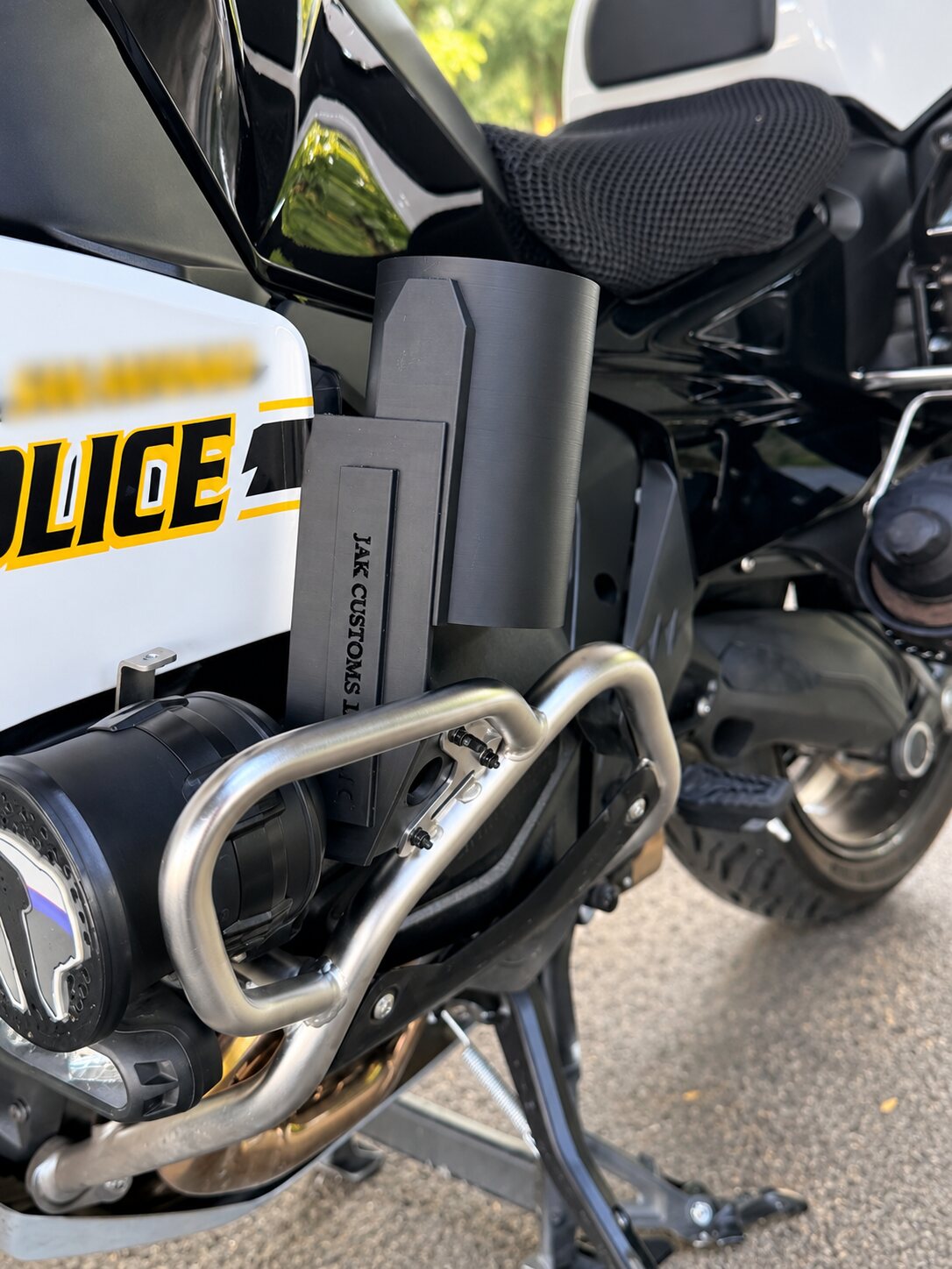 Police motorcycle side case with custom mounted accessories