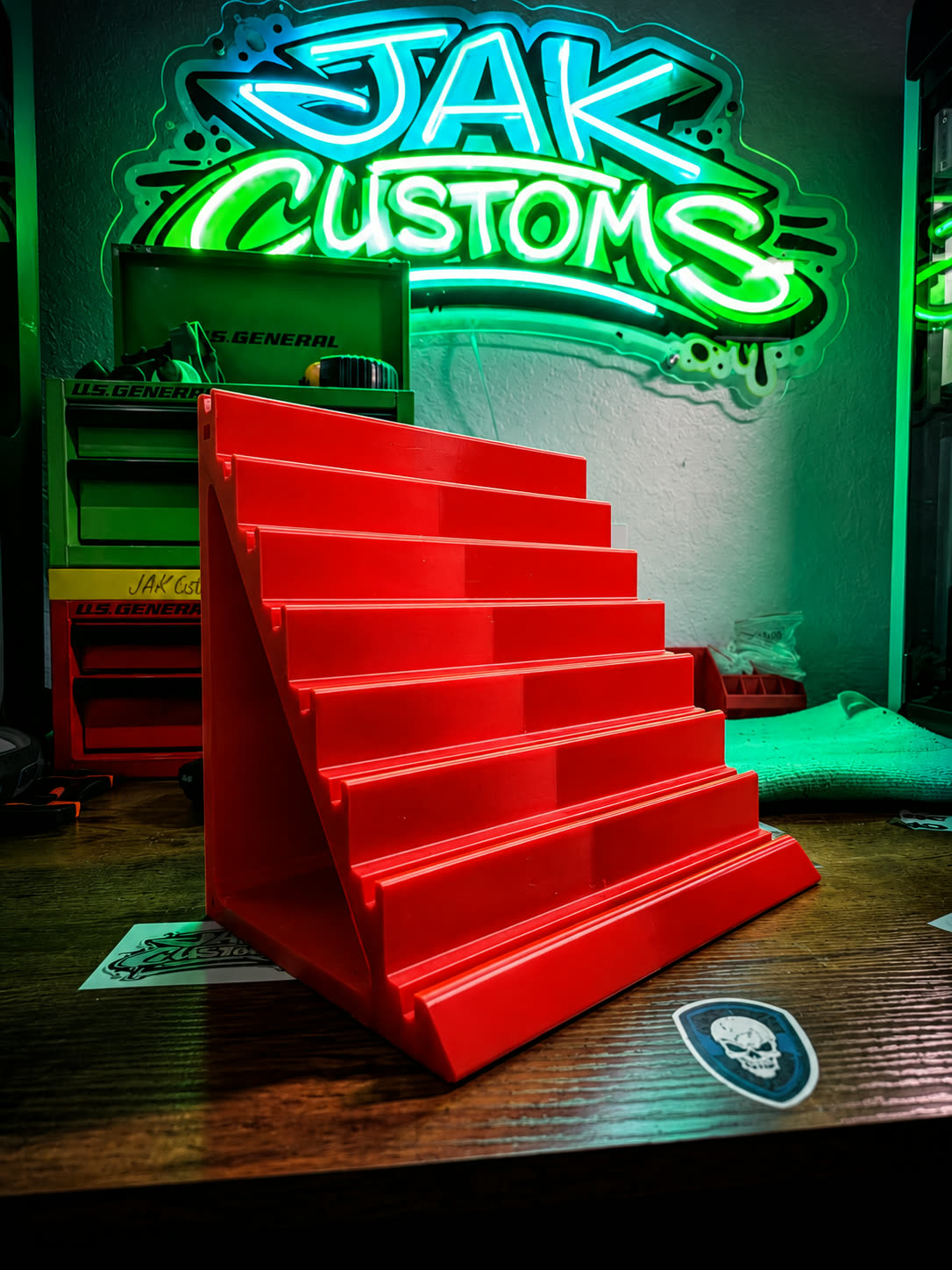 Red printed display stand built to hold a custom piece
