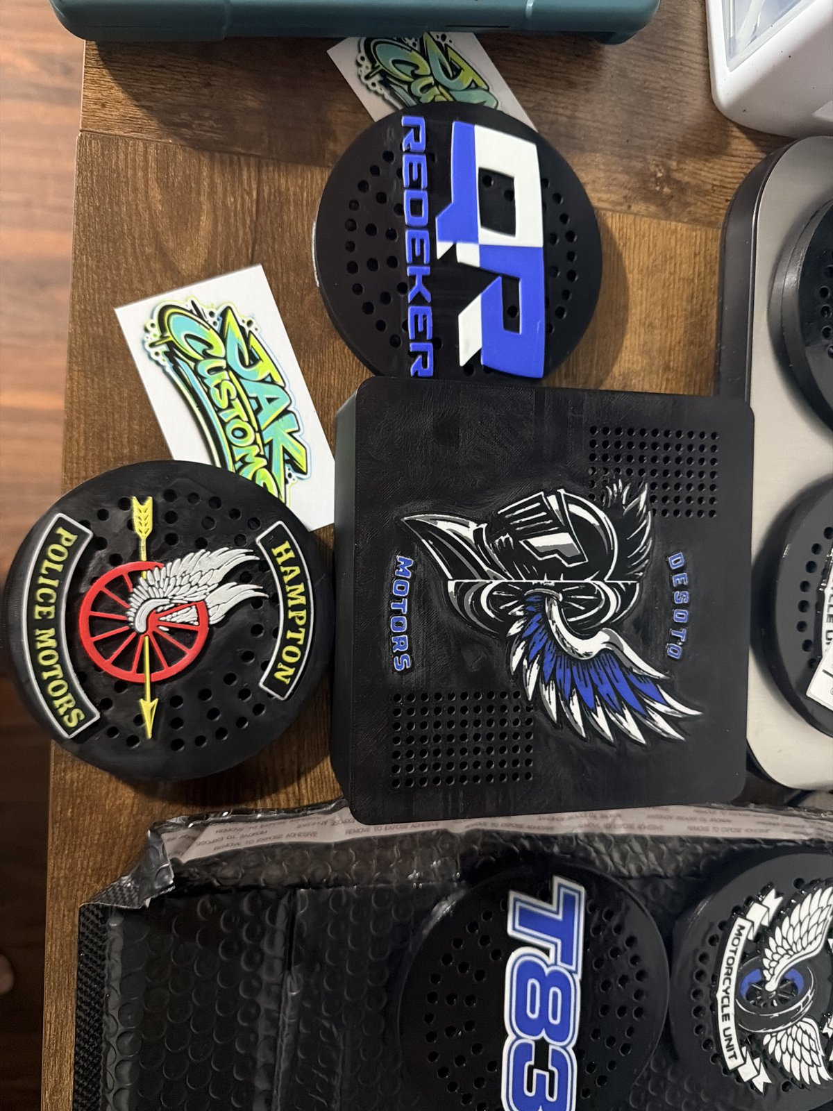 Selection of custom unit siren covers on the workbench