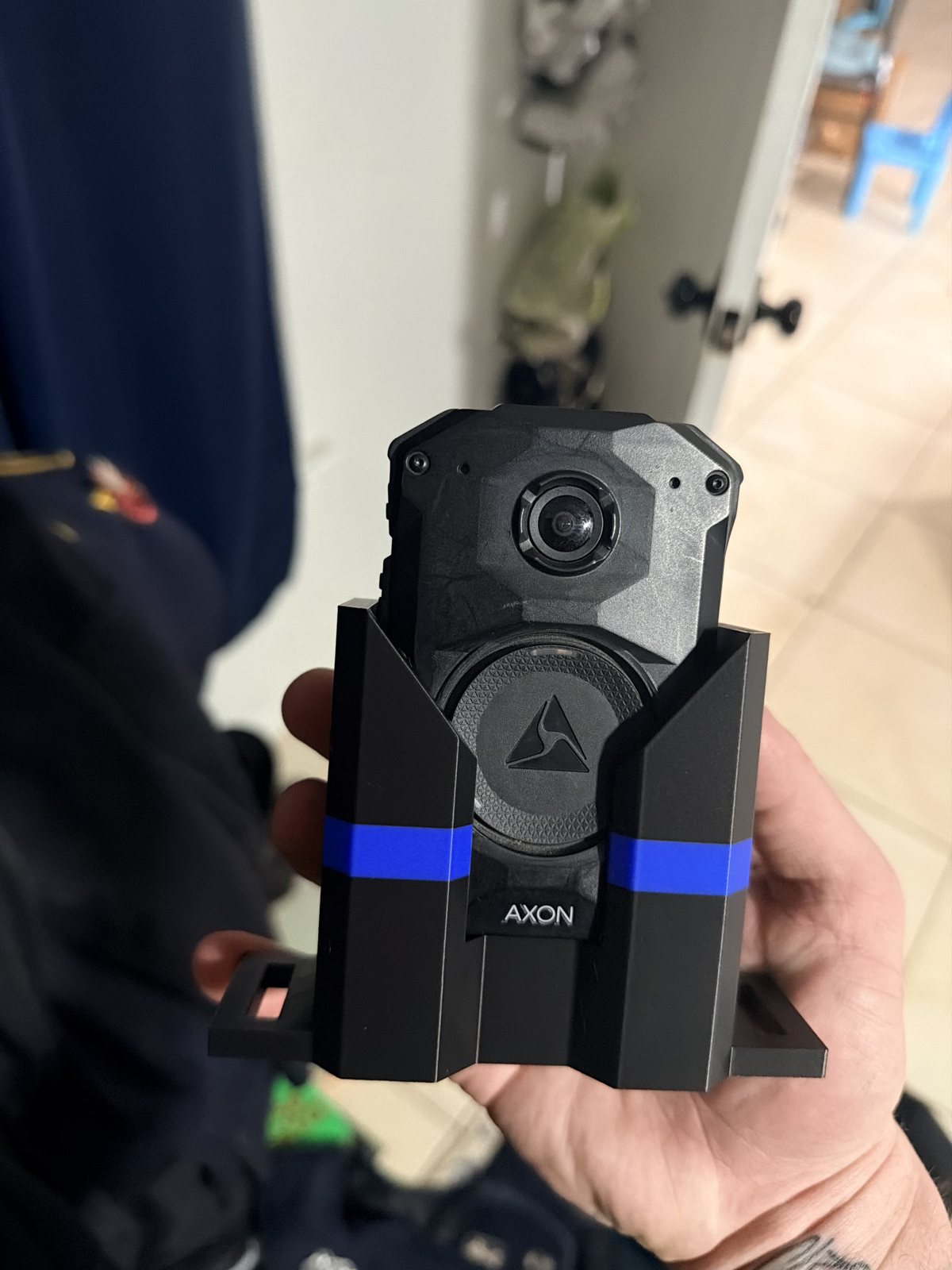 Handheld view of a custom black printed mount