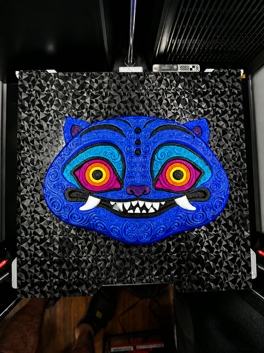Printed relief panel of a tiger portrait