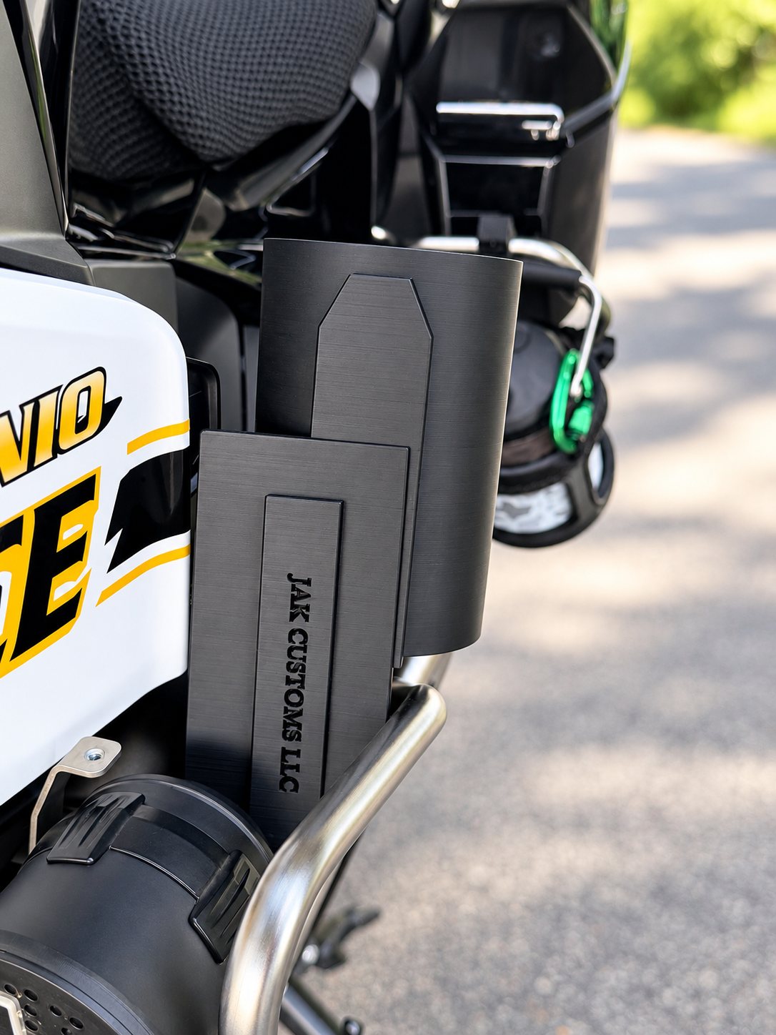 Rectangular black fitted cover mounted on a police motorcycle