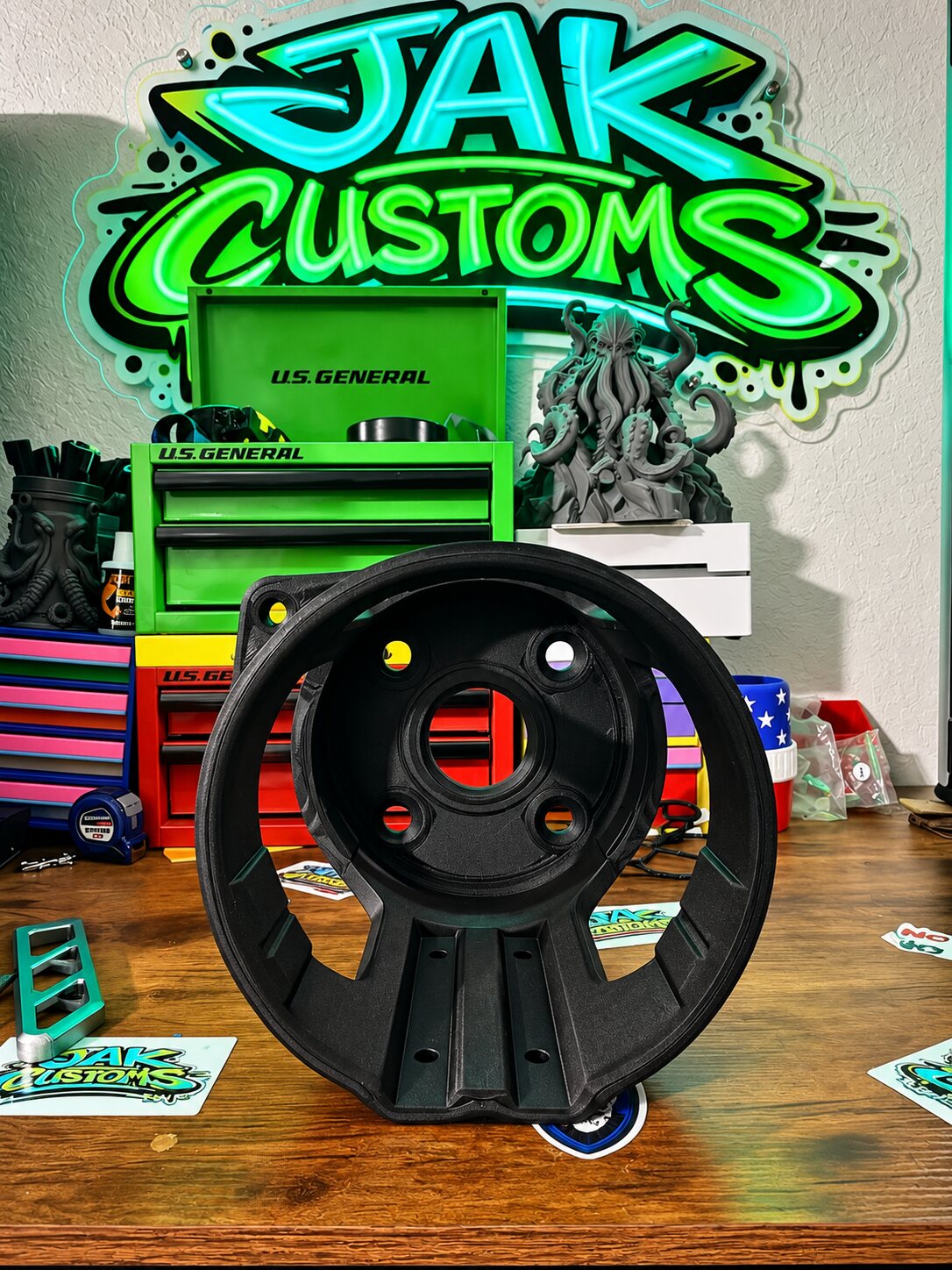 Black circular printed siren cover shown from the front