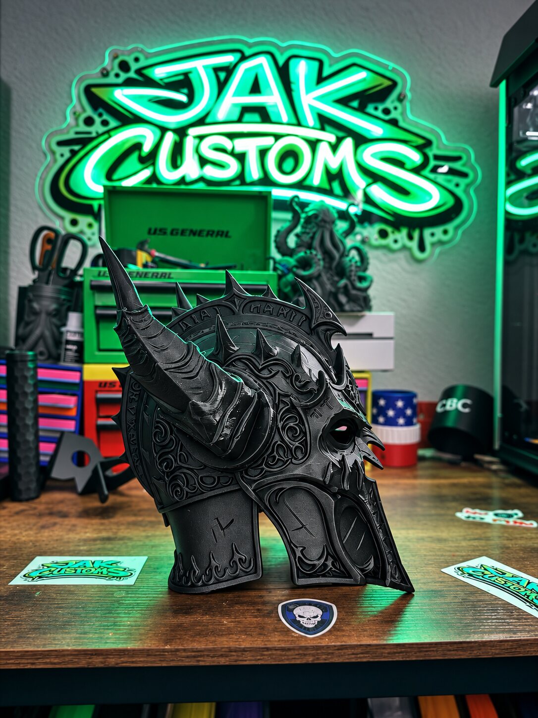 Black sculpted creature helmet, front view