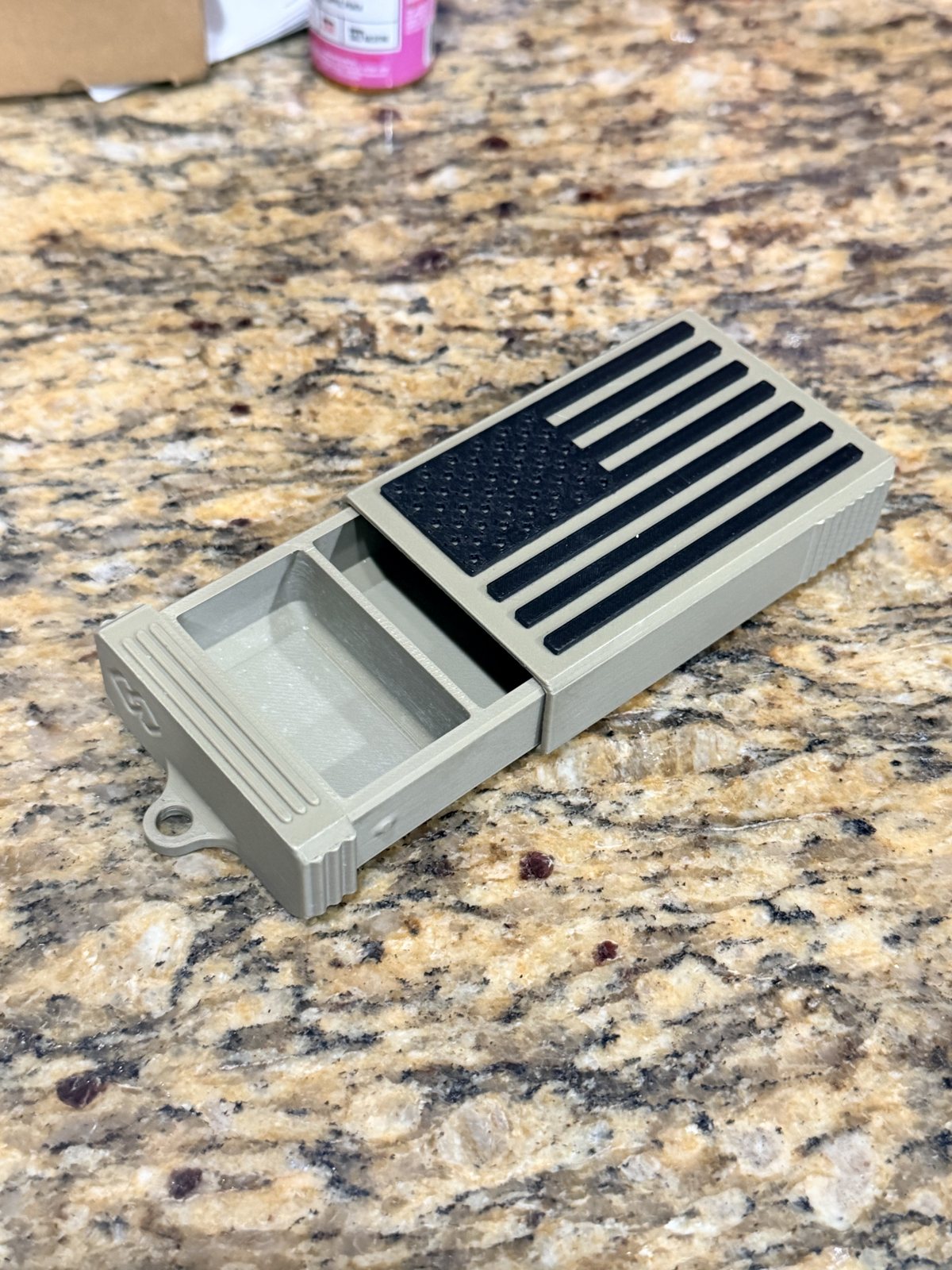 Ventilated gray printed replacement panel on a countertop