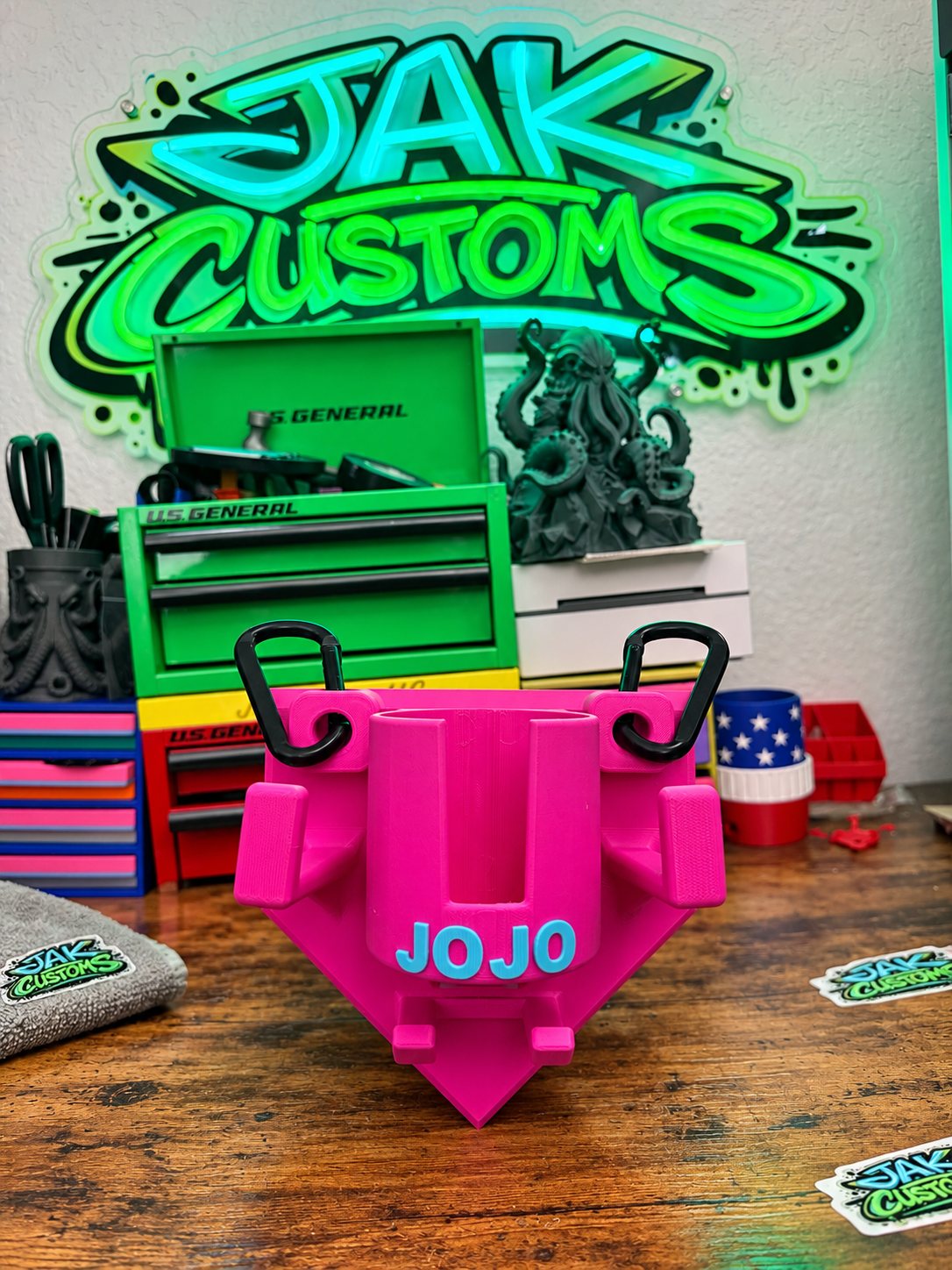 Bright pink custom printed holder displayed in the shop