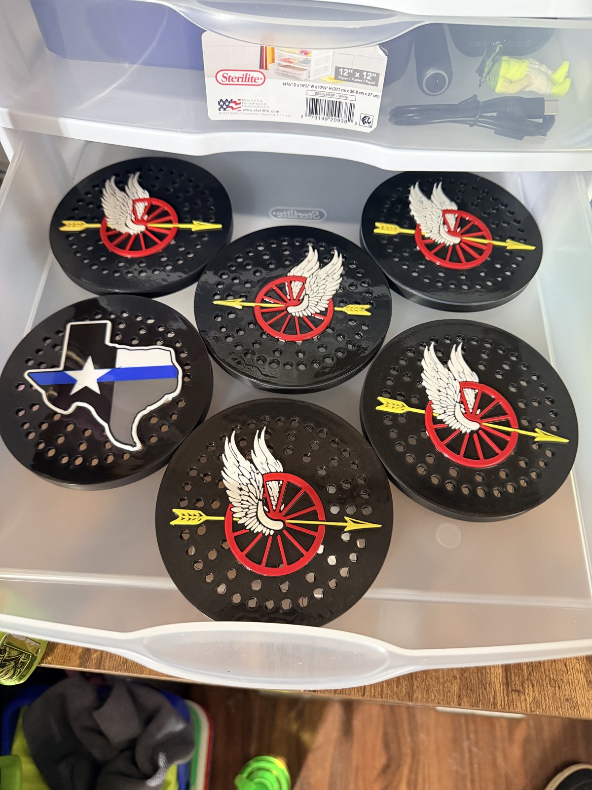 Custom police siren covers with red and gold insignias