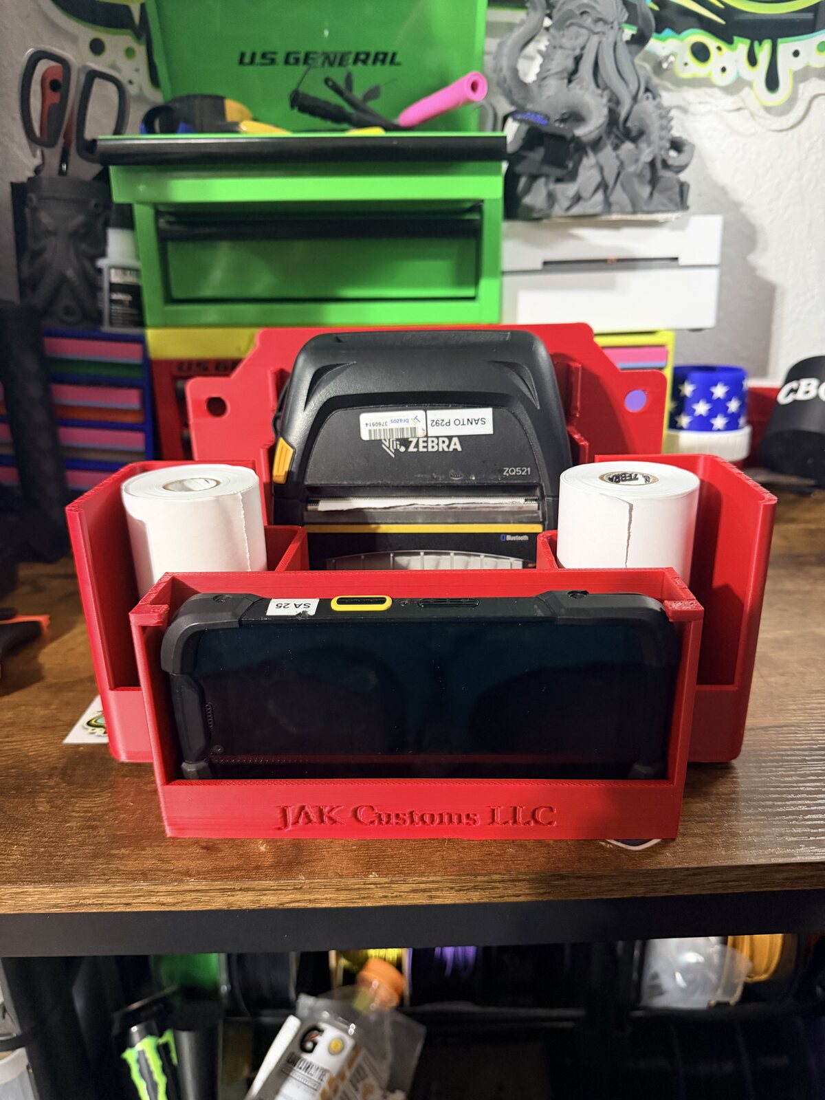 Red JAK Customs organizer caddy with printer and supplies on a workbench