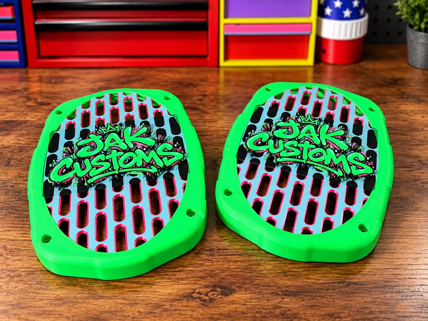 Pair of green printed vent covers with JAK Customs lettering