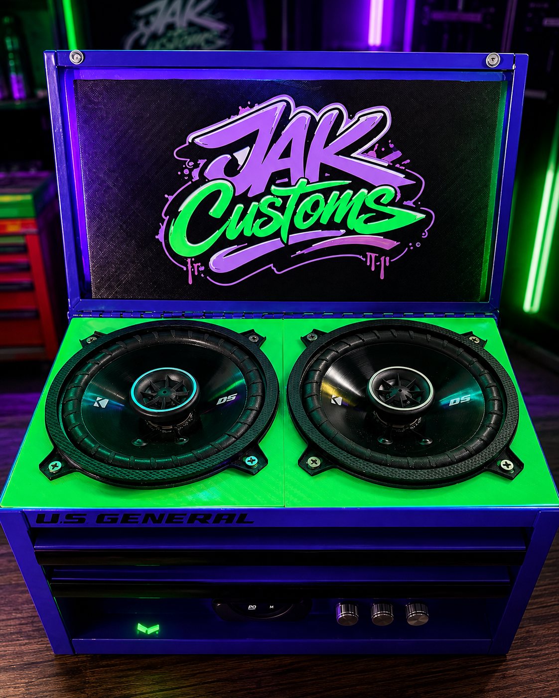Custom speaker enclosure with a glowing JAK Customs display